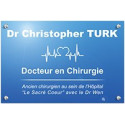 Plaque en plexiglas bleu avec texte blanc