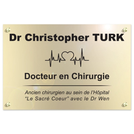 Plaque en plexiglas doré avec texte noir